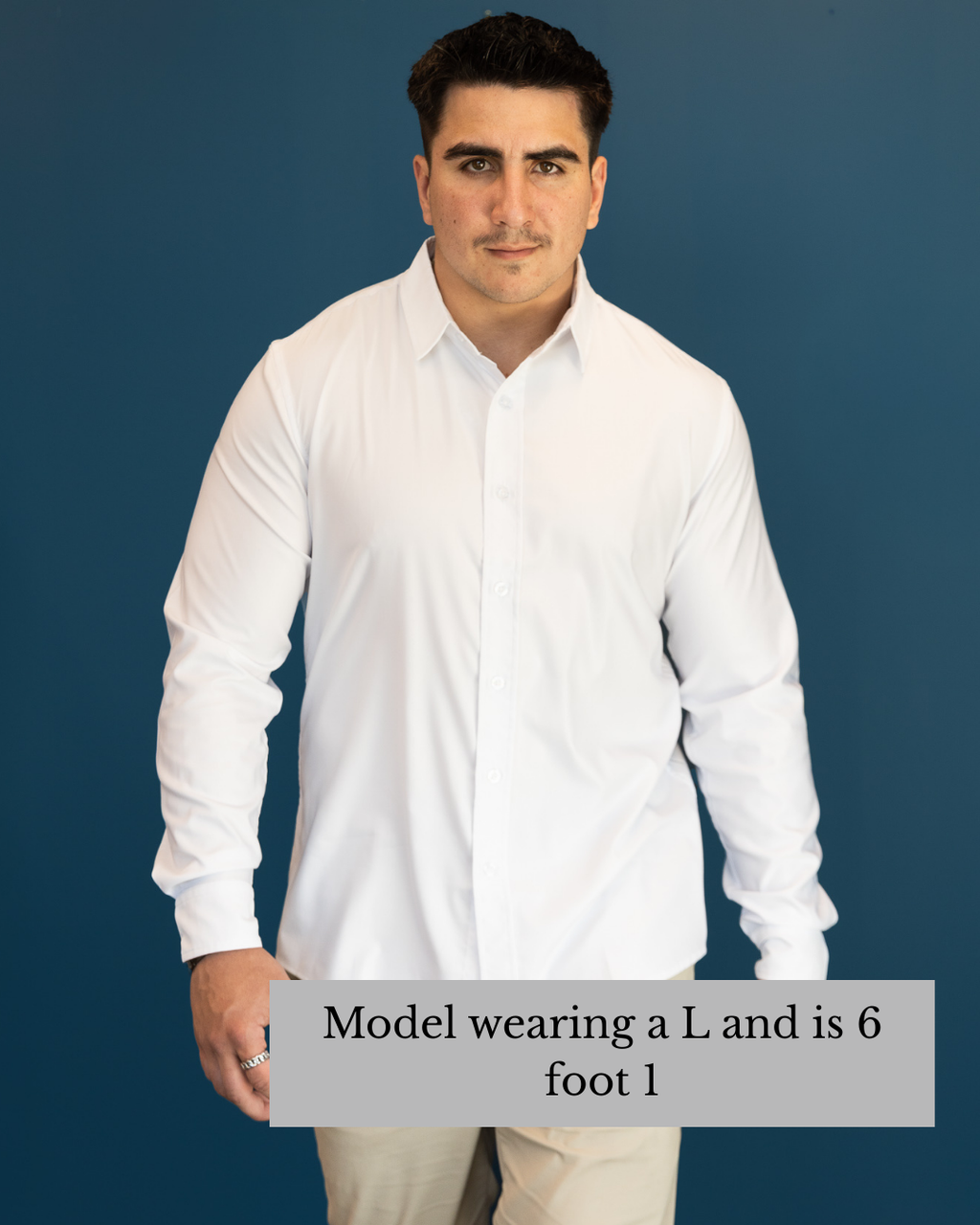 Man wearing a white shirt against a blue background with text indicating size and height.
