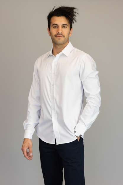 Man wearing a white shirt against a blue background