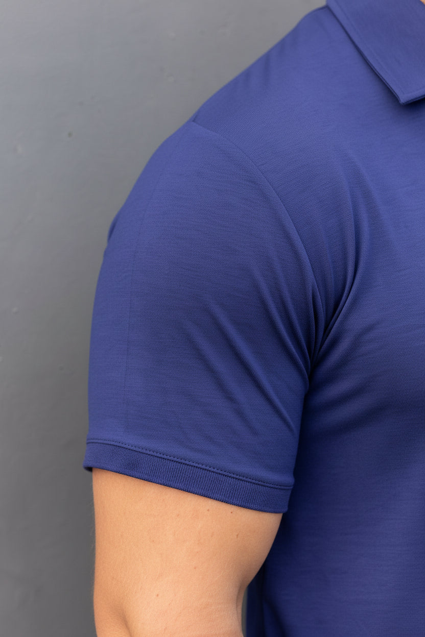 Man wearing navy Polo